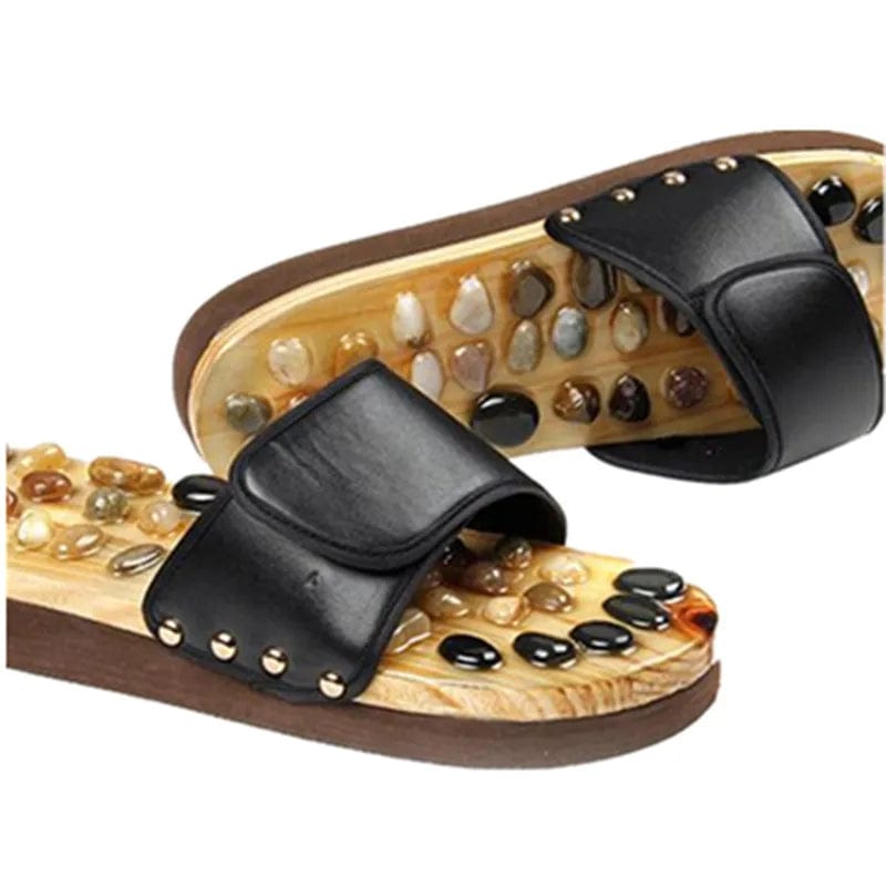 Image of sandals with natural stone for foot massage